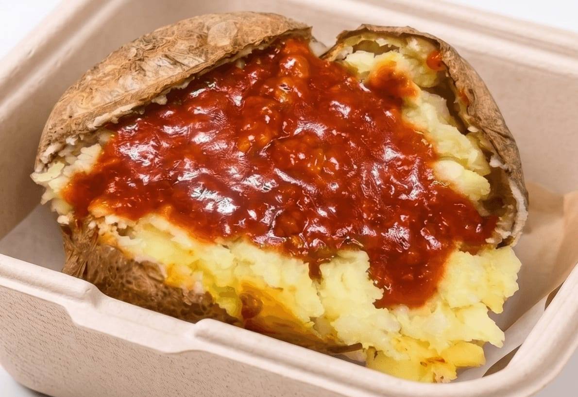 Jacket potato topped with homemade beef bolognese